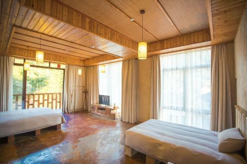 Mogan Mountain West House Hotel