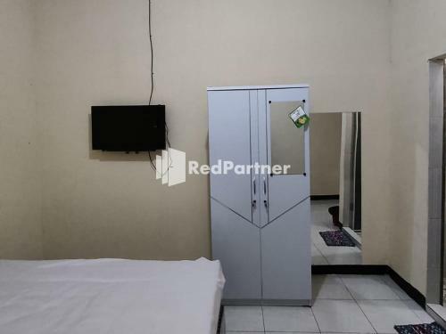 Hotel Kost Homestay Redpartner