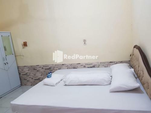 Hotel Kost Homestay Redpartner