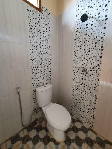 Hotel Oyo 90945 Arizon Kost