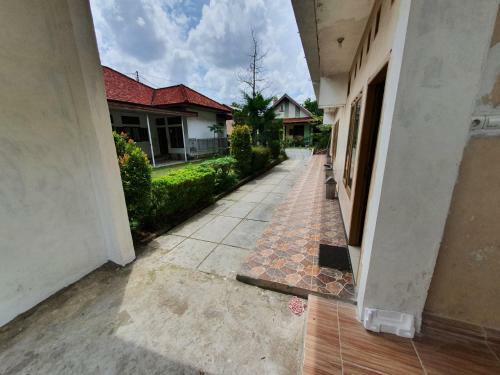 Hotel Oyo 90945 Arizon Kost