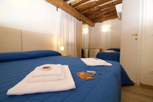 Hostal Veneziacentopercento Rooms