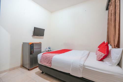 Hotel Oyo 122 Oekude Kost