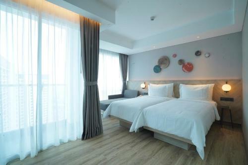 Hotel Harris Suites Puri Mansion