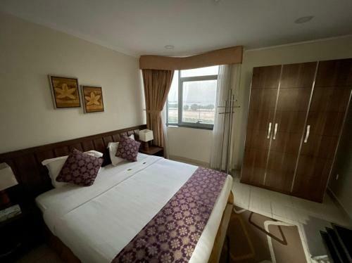 Apartamento Enwan Suites Hotel