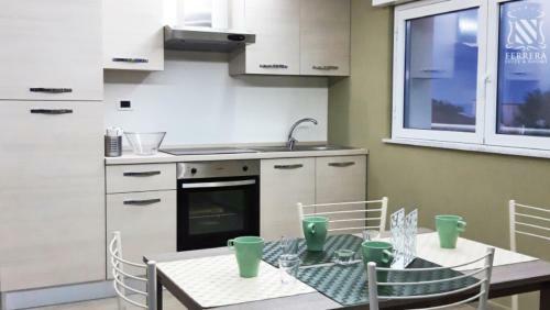 Apartamento Laguna Blu - Ferrera Suite & Rooms