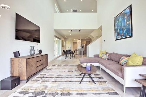 Sleek Townhome With Private Pool, Gym, And More!