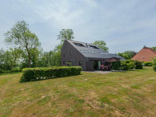 Elegant Holiday Home With Sauna In Langweer