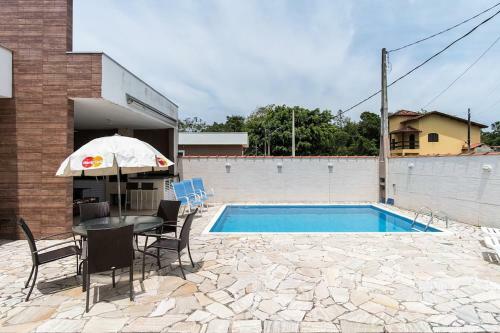 Casa Com Piscina E Churrasq Na Praia Massaguacu, Sp