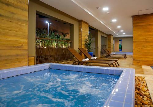 Apartamento Ol�mpia Park Resort Apto