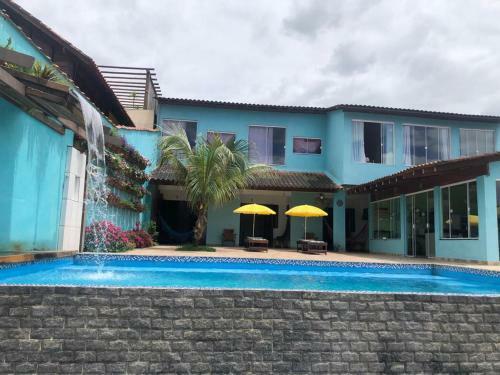 Hostal Aconchego Su�tes