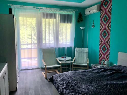 �va Apartman, Helikon-liget
