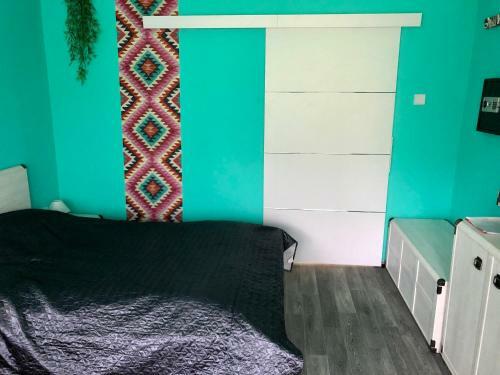 �va Apartman, Helikon-liget