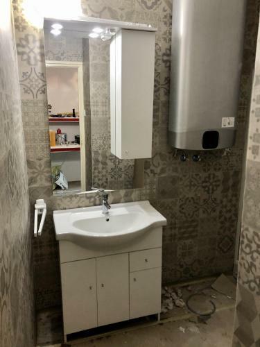 �va Apartman, Helikon-liget