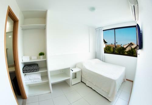 Apartamento Nui Supreme Resort - Ref�gio � Beira Mar