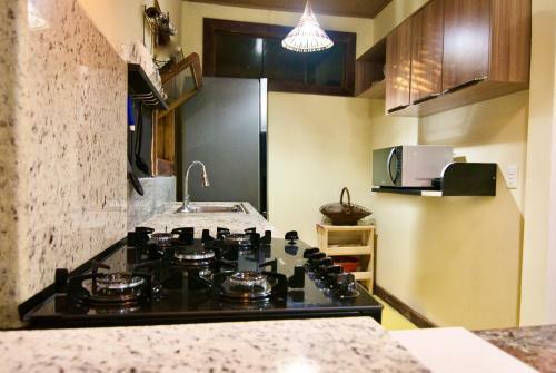 Apartamento Oxumar� Chal�