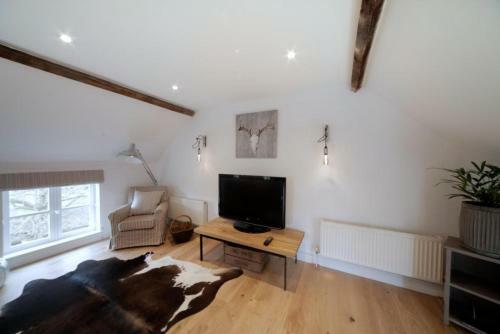 Apartamento The Barn @bourne Eau House