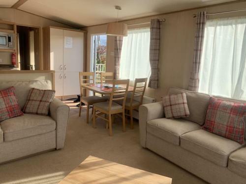 Woodpecker Lodge, Camelot Holiday Park, Ca6 5sz
