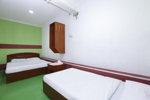 Oyo 89784 Impiana Hotel