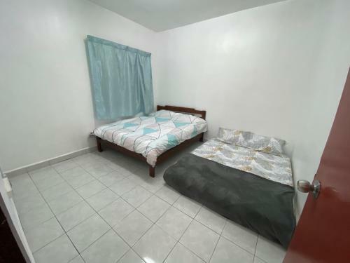 Apartamento Cameron Highland Cozy Homestay