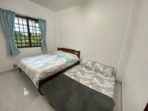 Apartamento Cameron Highland Cozy Homestay