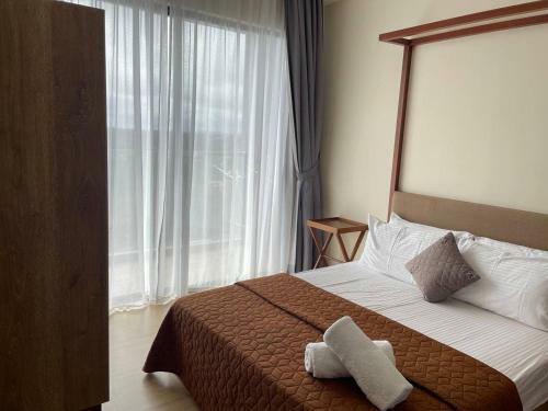Apartamento Hideaway@timurbay Seafront Residence