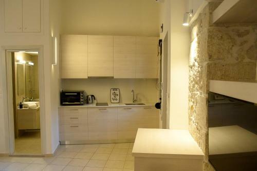 Apartamento Uni Island City Center Suites