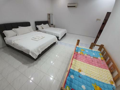 Bersatu Queenco Homestay Muar