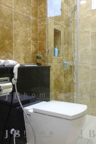 Apartamento Paragon Residences Straits View Homestay