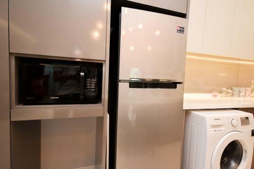 Apartamento Suasana Suite By Nest Home