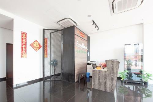 Capital O 90447 Hotel Ezzyhome Kebun Teh