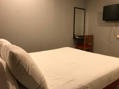 Oyo 90487 K Threegod Hotel