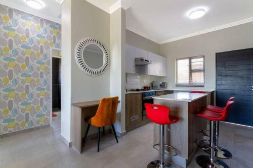 Apartamento Alimama Spaces: The Thando's Kyalami Woods