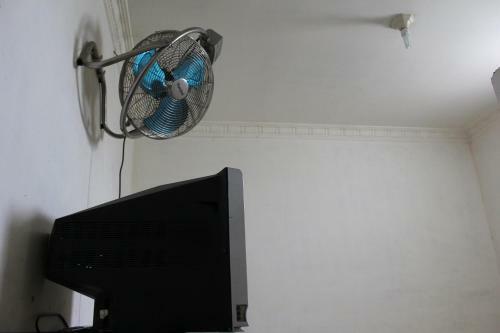 Hostal Penginapan Transit Tomato