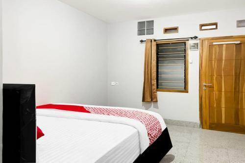 Hotel Oyo 90708 Kbr Home