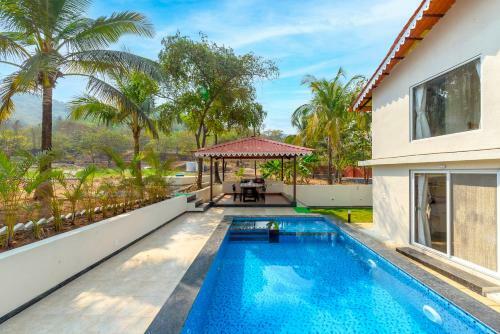 Villa Saffronstays Coral Hues