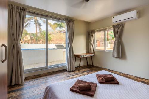 Villa Saffronstays Coral Hues