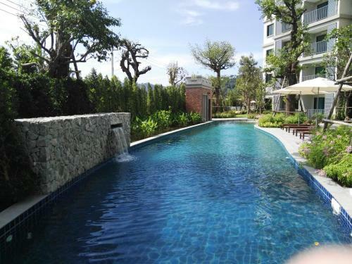 Apartamento The Beachcomber @ Naiyang Beach
