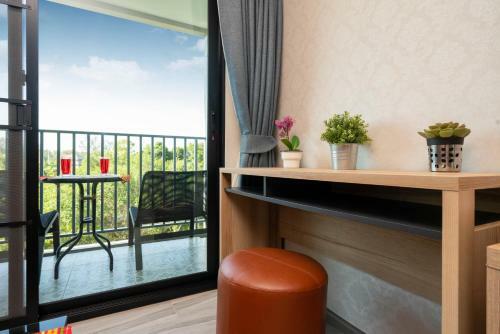 Apartamento The Beachcomber @ Naiyang Beach