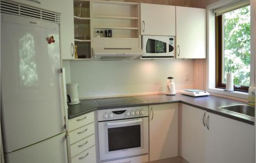 Holiday Home Stokkepil-holmen