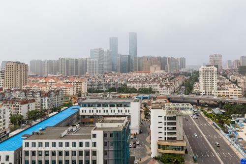 Hotel Qingdao Shinan�wusi Square�