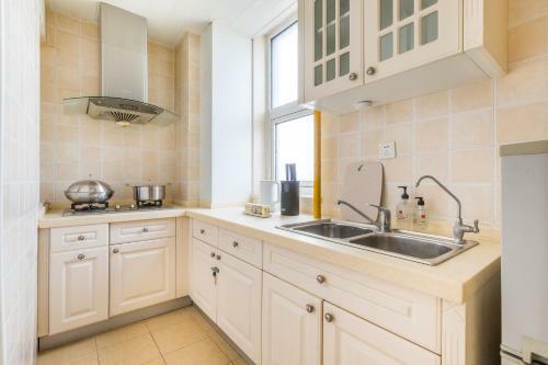 Hotel Qingdao Shinan�wusi Square�