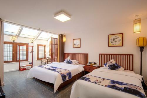 Floral Hotel Rizhao Xiuwenzhai Inn