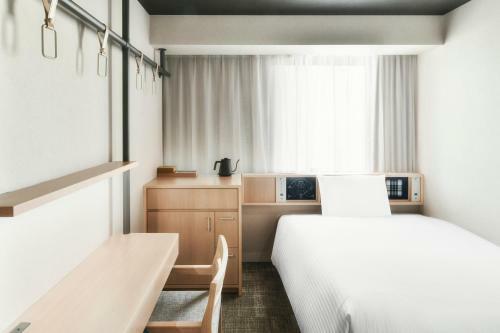 Ref Matsuyama City Station By Vessel Hotels