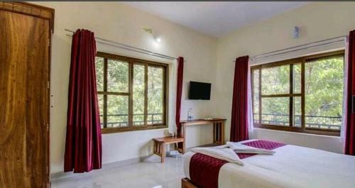 Hotel Whispering Woods By Aura Hospitality