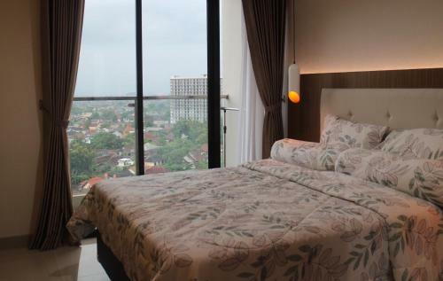 Apartamento The Wongso Patraland Amarta