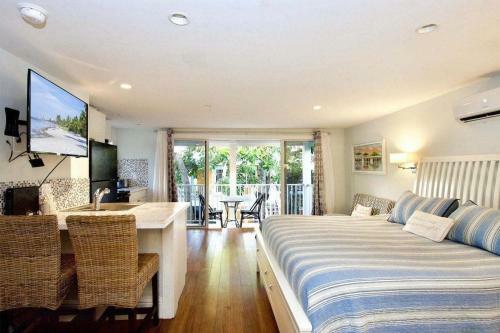 Apartamento Mojoe's Villa 9 - Steps From The Beach