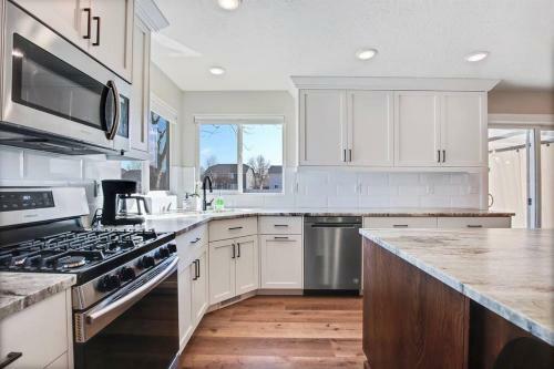 The White Custom Farmhouse 5 Bedroom Home