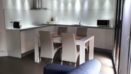 Apartaments Y Habitacions Entre Volcans