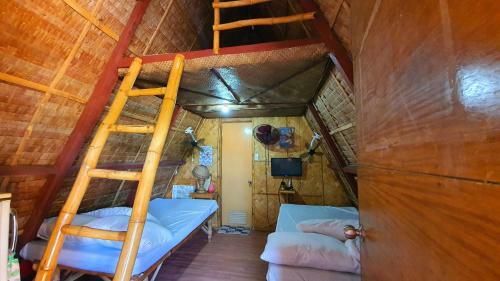 Hostal Calatagan's Bahay Kubo
